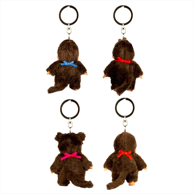 Four Sekiguchi Monchhichi plush keychains featuring classic characters with colored bibs and bows viewed from the back