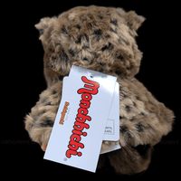 Sekiguchi Monchhichi 8-inch plush monkey wearing leopard hood and cape with attached brand tags back view