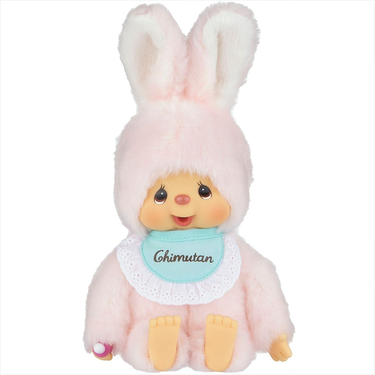 Sekiguchi Monchhichi Chimutan Plush in pastel pink bunny costume with baby blue bib sitting and smiling