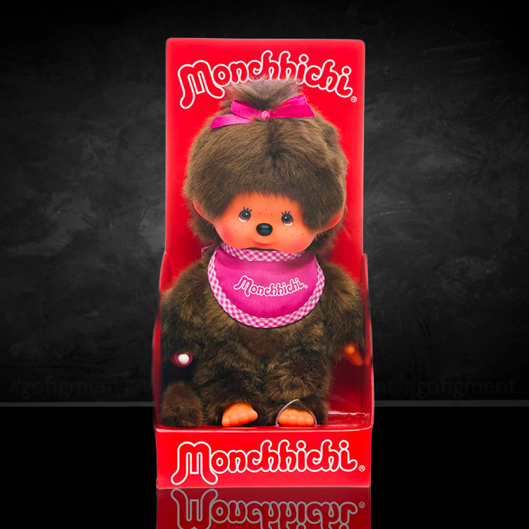 Sekiguchi Monchhichi Classic Girl plush with pink bib in original red box, 8 inches tall collectible toy.