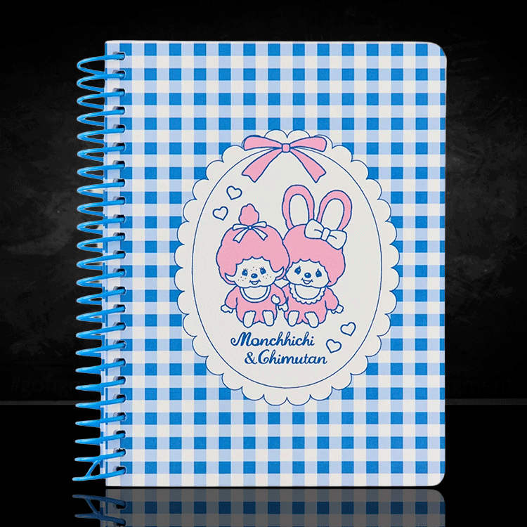 Go Figment Monchhichi & Chimutan spiral notebook with blue checkered cover and pink character illustration