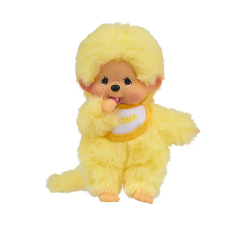 Sekiguchi Monchhichi plush in sunny yellow with bib and pacifier, 5.5 inches tall, soft and collectible design