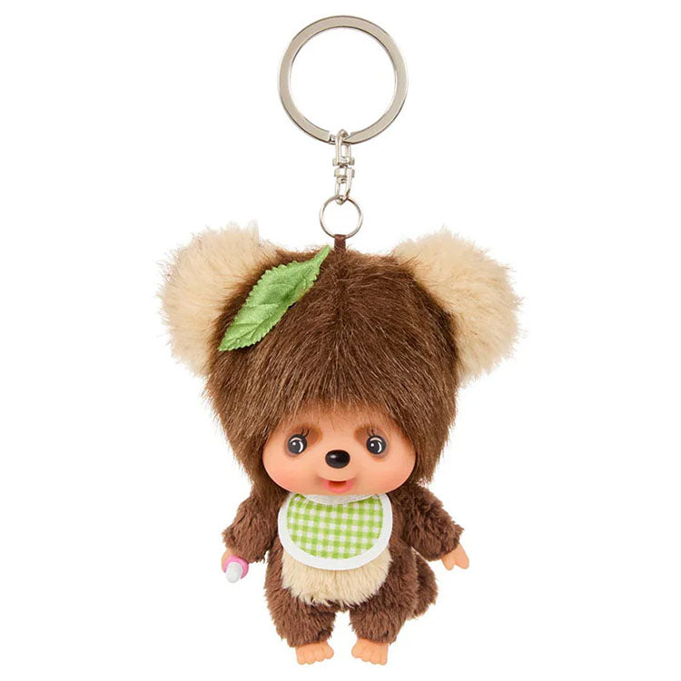 Sekiguchi Monchhichi plush keychain dressed as a tanuki with thumb-sucking pose and silver keyring attachment