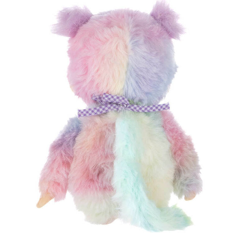 Sekiguchi Monchhichi plush doll with pastel tie-dye fur and a purple checkered ribbon bow on white background