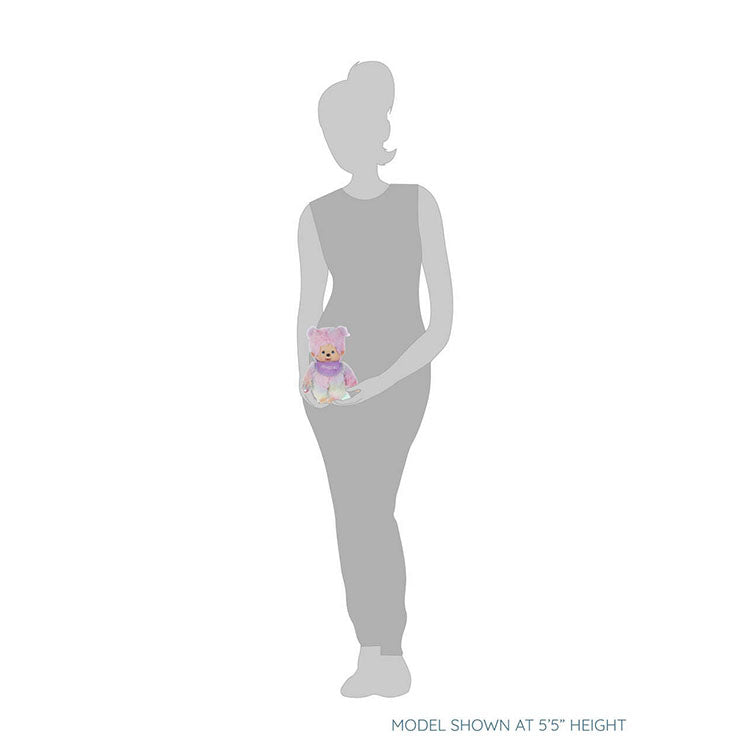 Sekiguchi Monchhichi 8-inch tie-dye girl plush doll held by a woman silhouette for size reference