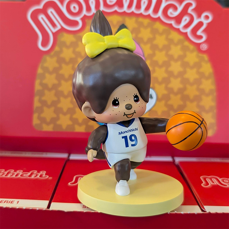 Sekiguchi Monchhichi Girl Basketball Player vinyl figure dribbling basketball on yellow base from Sports Series 1.