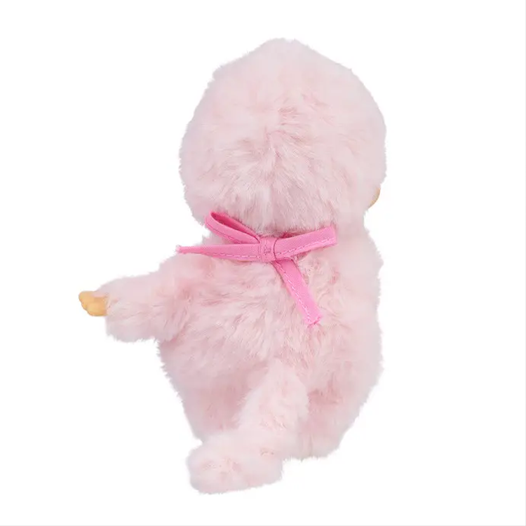 Sekiguchi Monchhichi Sweet Pink plush monkey wearing a pink beanie bow, soft and cuddly from the back view.