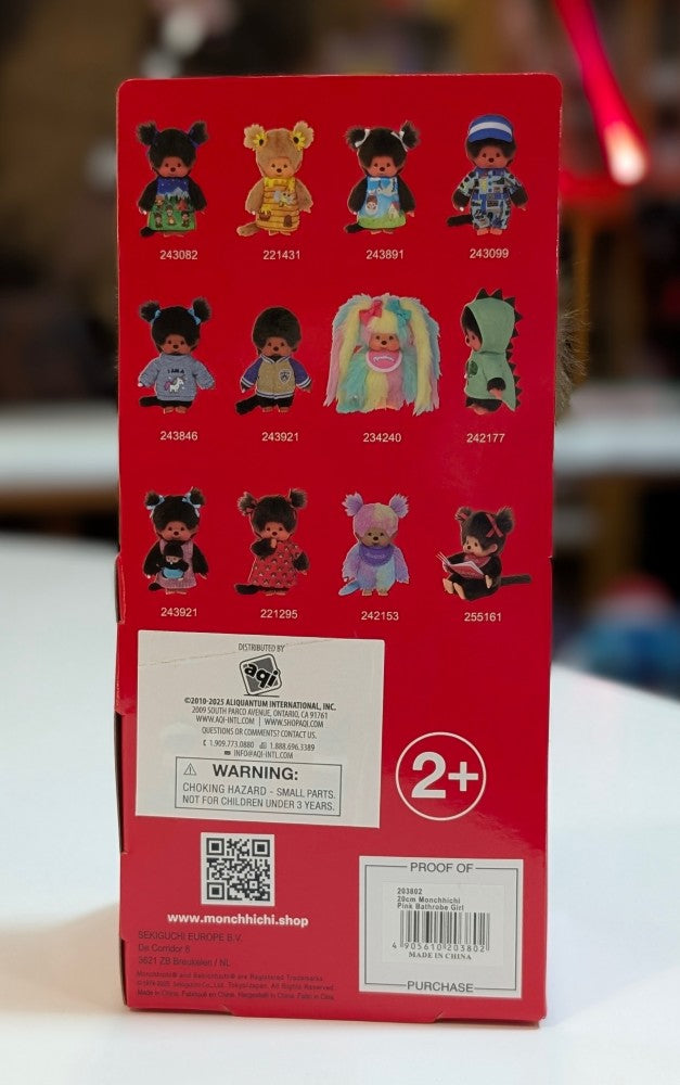 Sekiguchi Monchhichi product packaging featuring various doll designs on red background with warning label and QR code