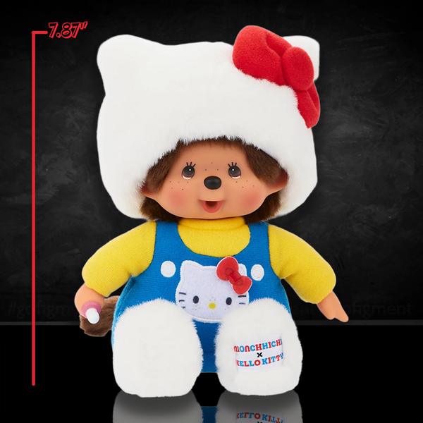Monchhichi plush wearing a Hello Kitty hood with red bow and blue overalls measuring 7.87 inches tall