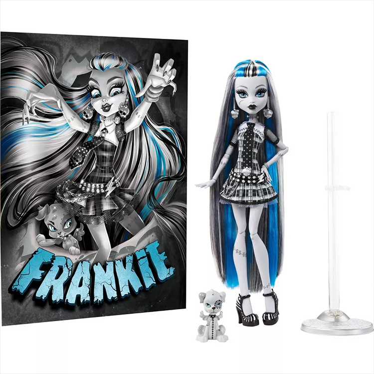 Mattel Monster High Frankie Stein doll in black and white plaid dress with blue hair highlights and accessories