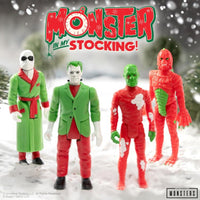 Hasbro Universal Monsters ReAction action figures dressed in holiday attire on snowy background with Monster in My Stocking logo