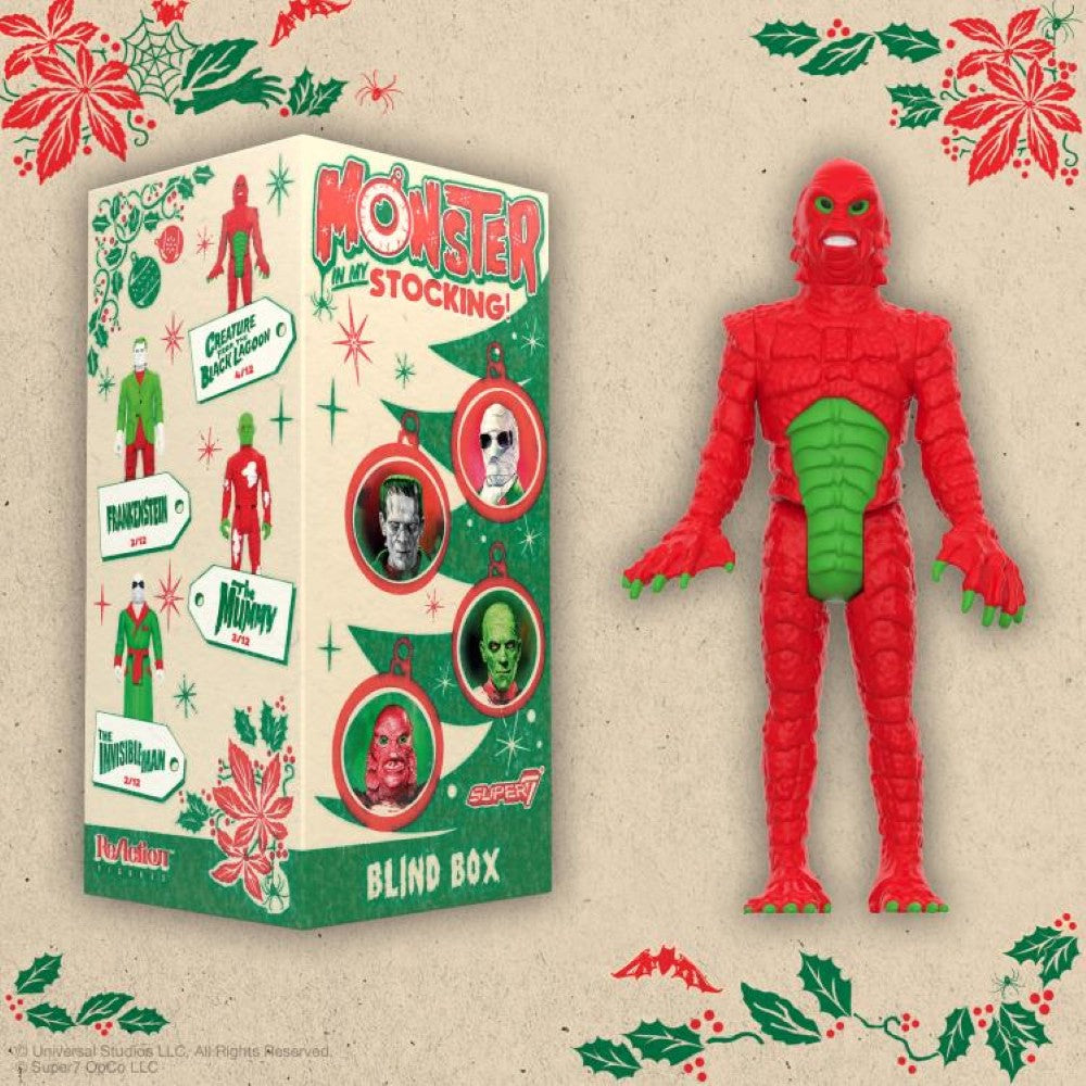 Hasbro Universal Monsters ReAction Monster In My Stocking blind box with red and green creature figure on festive background