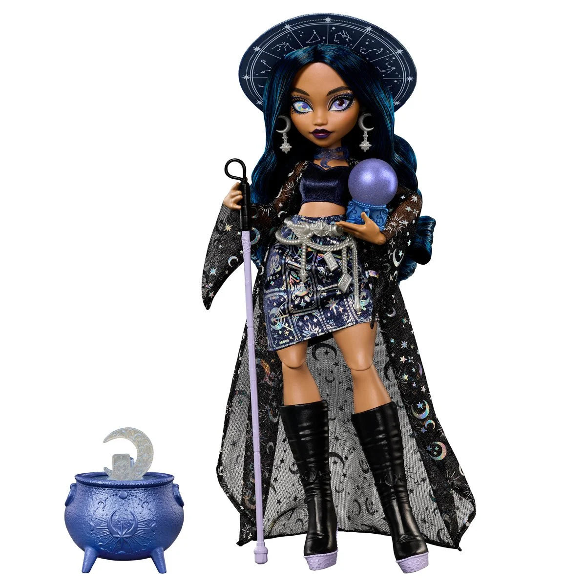 Doll dressed as a sorceress with star and moon patterns, holding a staff and crystal ball next to a cauldron prop.