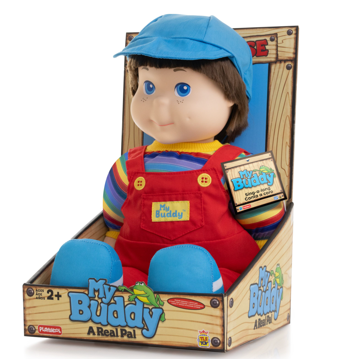My Buddy Playskool 18-inch doll in red overalls, blue hat, and striped shirt, seated in box packaging.