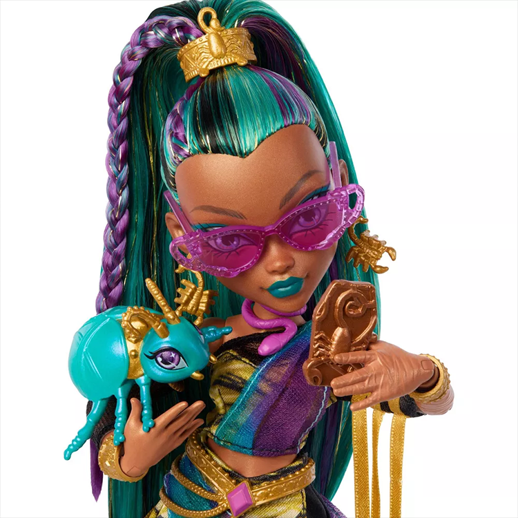 Monster High Nefera De Nile Doll with teal and purple hair, gold accessories, holding a blue pet scarab and a golden phone.