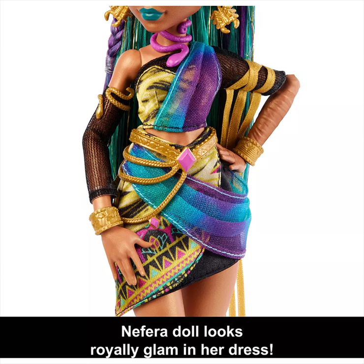 Nefera De Nile doll dressed in vibrant gold and purple outfit with detailed accessories by Mattel.