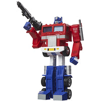Hasbro Transformers G1 Optimus Prime figure in classic red and blue pose with blaster raised