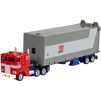Hasbro Transformers G1 Optimus Prime truck mode with trailer featuring authentic vintage design and Autobot insignia