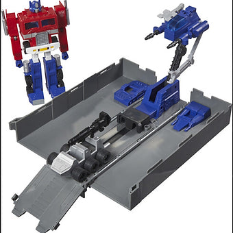 Hasbro Transformers G1 Optimus Prime action figure with trailer battle station and accessories displayed on white background
