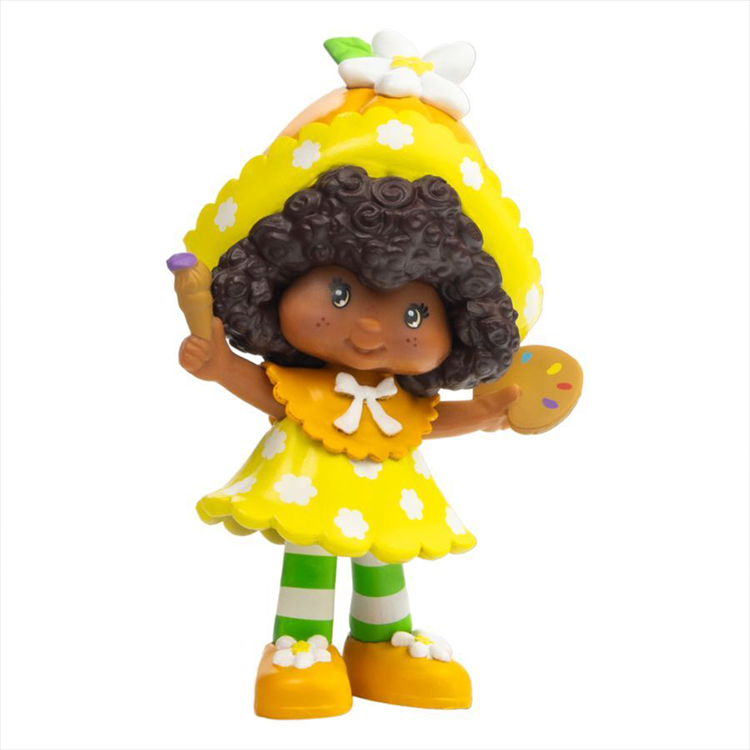 Loyal Subjects Strawberry Shortcake Cheebee figure wearing yellow dress with paintbrush and palette accessory