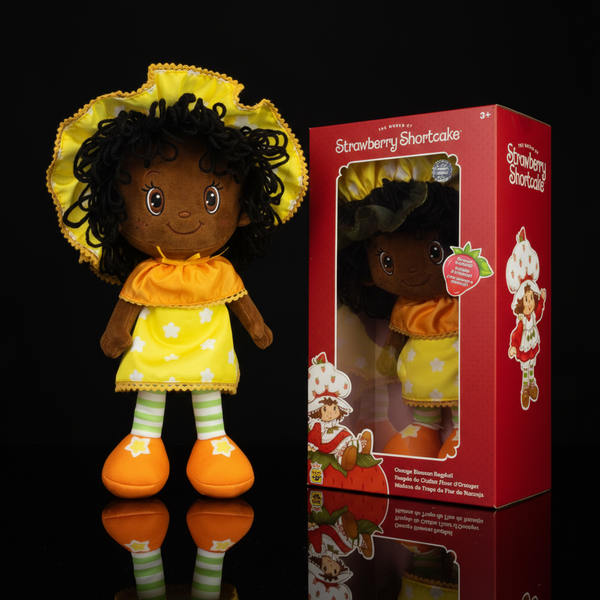 Limited edition Loyal Subjects 14-inch Orange Blossom rag doll in yellow outfit with citrus scent in Strawberry Shortcake box