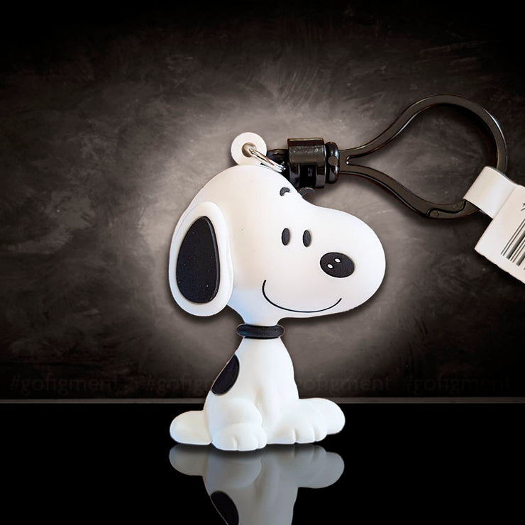 Monogram Snoopy bag clip featuring classic smiling Peanuts character in durable 3D foam, perfect for collectors.