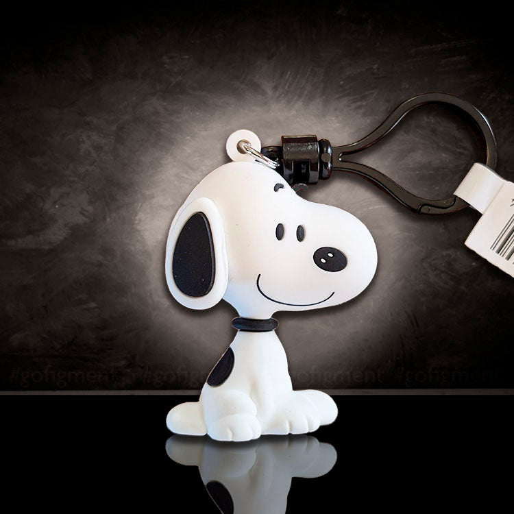 Monogram Snoopy bag clip featuring classic smiling Peanuts character in durable 3D foam, perfect for collectors.