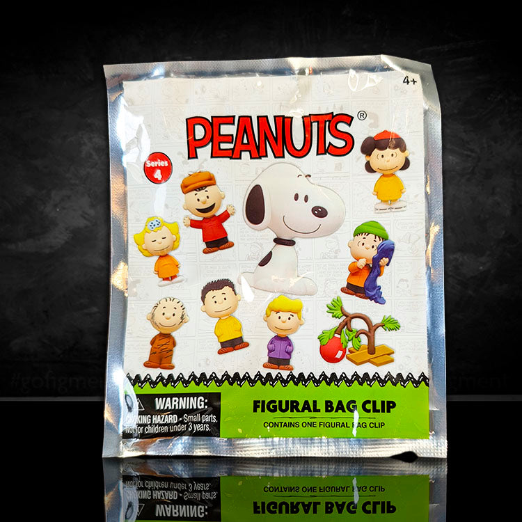 Monogram Peanuts Series 4 figural bag clip blind box featuring characters like Frieda and Snoopy in colorful packaging.