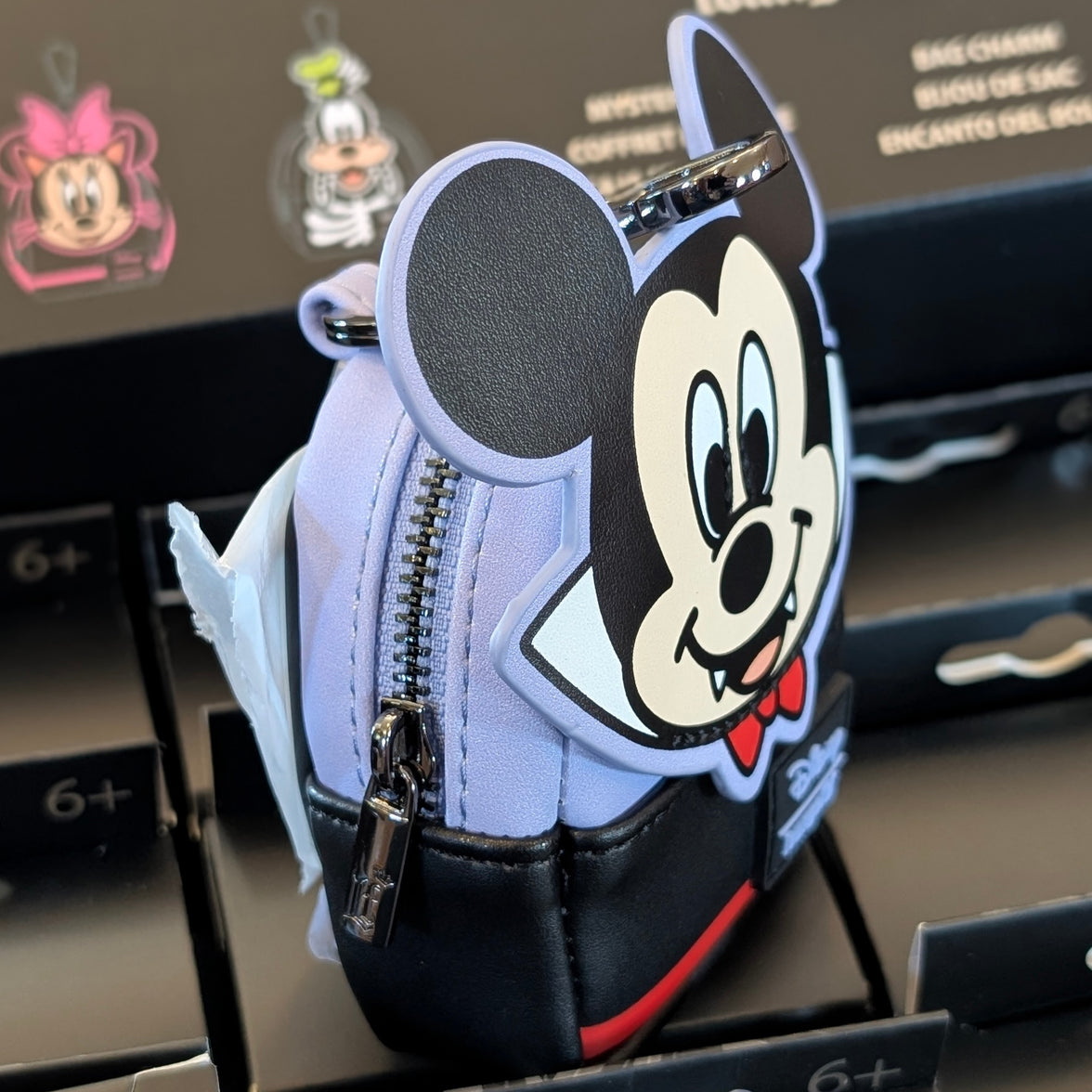 Loungefly Disney mini backpack charm featuring Mickey Mouse as a vampire with working zipper and black cape design.
