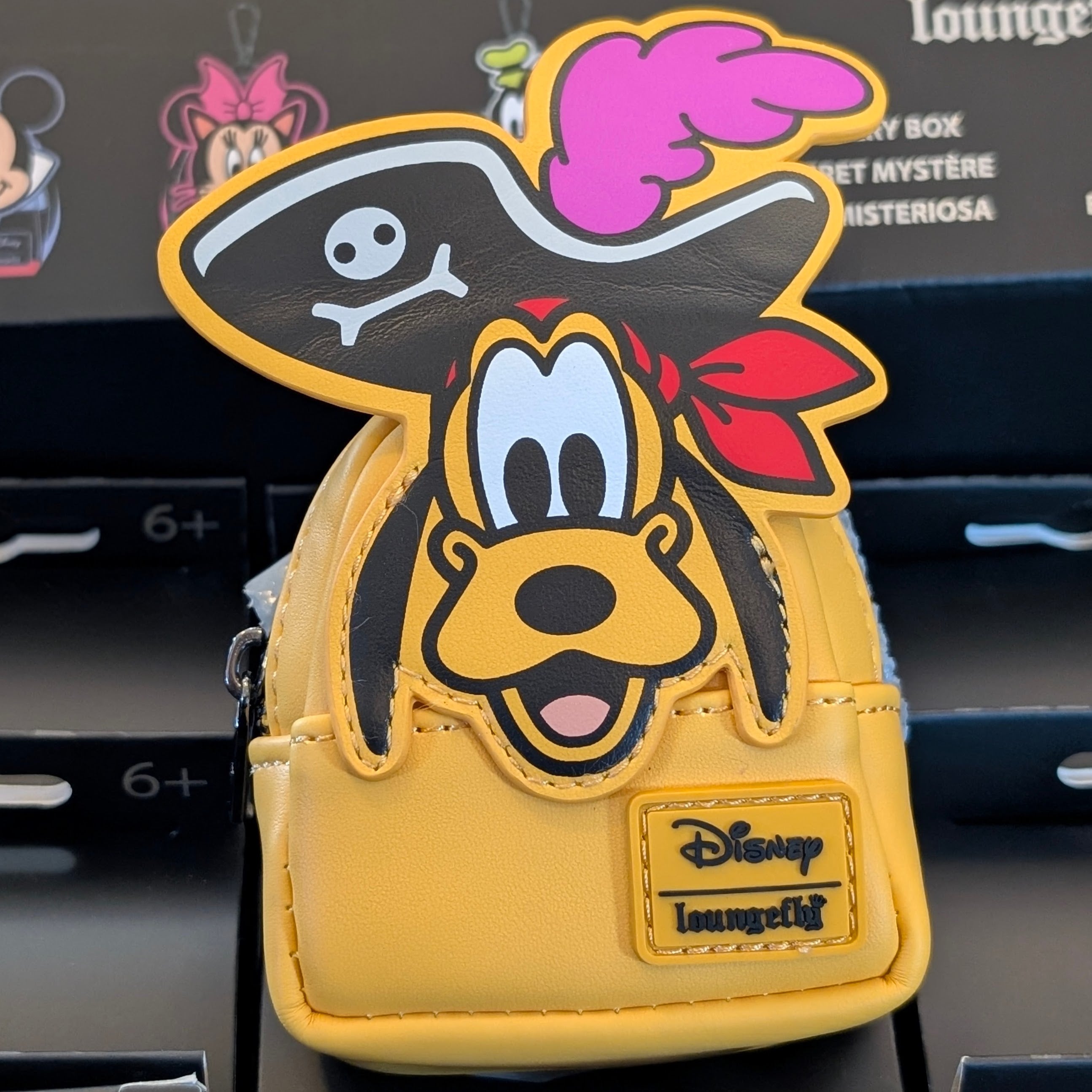 Loungefly mini backpack bag charm featuring Pluto dressed as a pirate with a skull hat detail