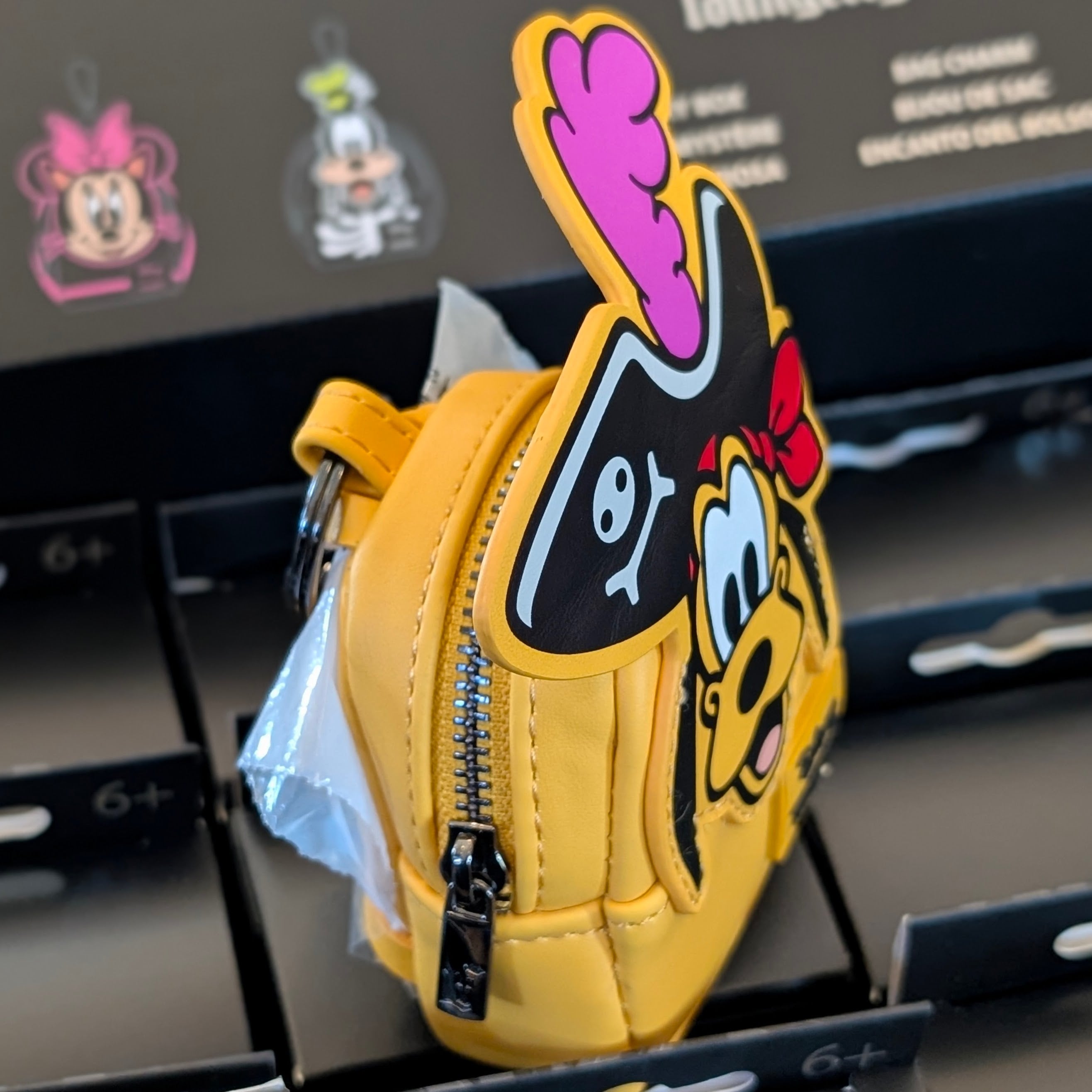 Loungefly Disney mini backpack bag charm featuring Pirate Pluto with detailed zipper and bold design