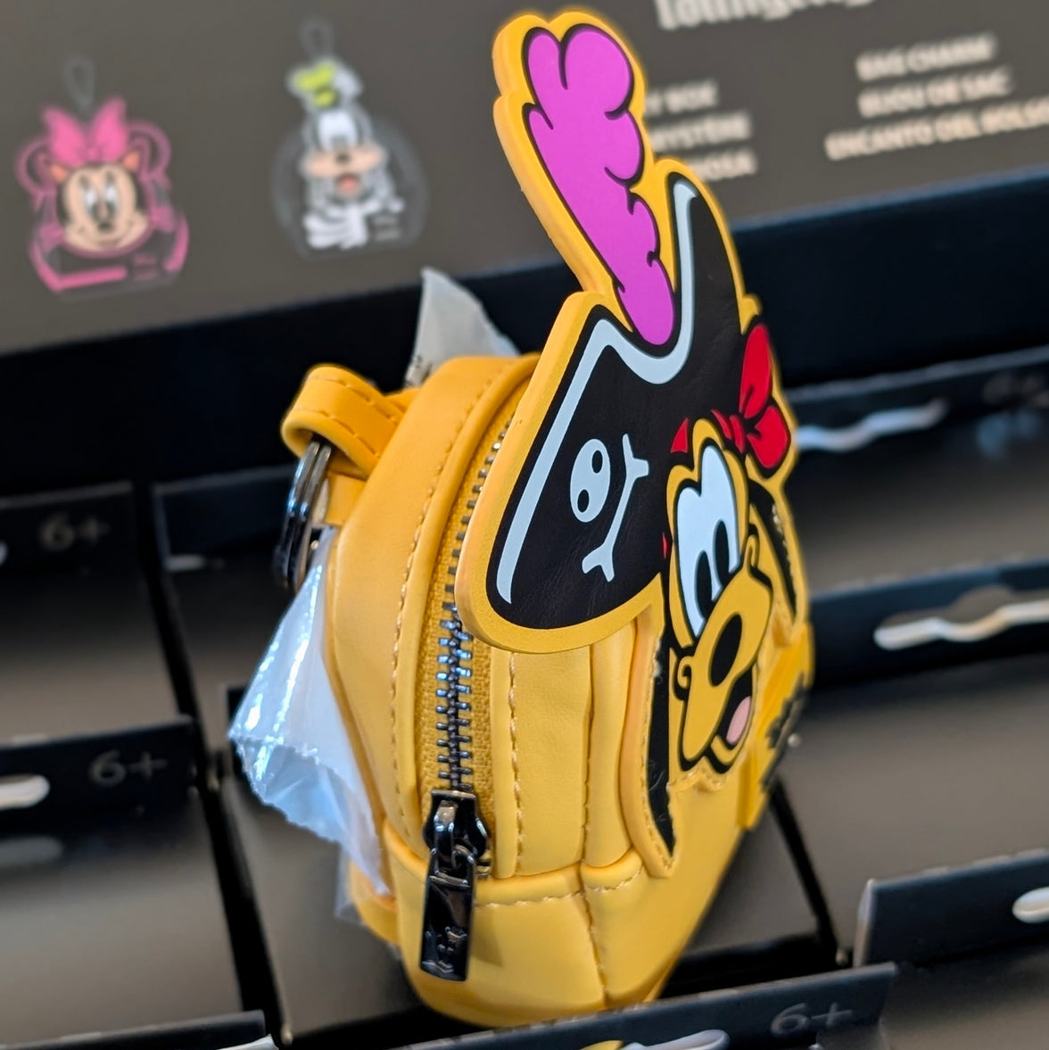 Loungefly Disney mini backpack bag charm featuring Pirate Pluto with detailed zipper and bold design