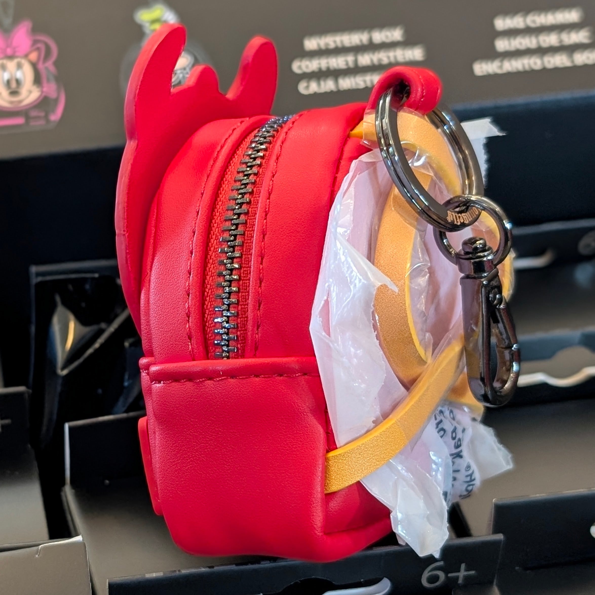 Red mini backpack bag charm with devil horns by Loungefly, inspired by Devil Donald Duck costume design
