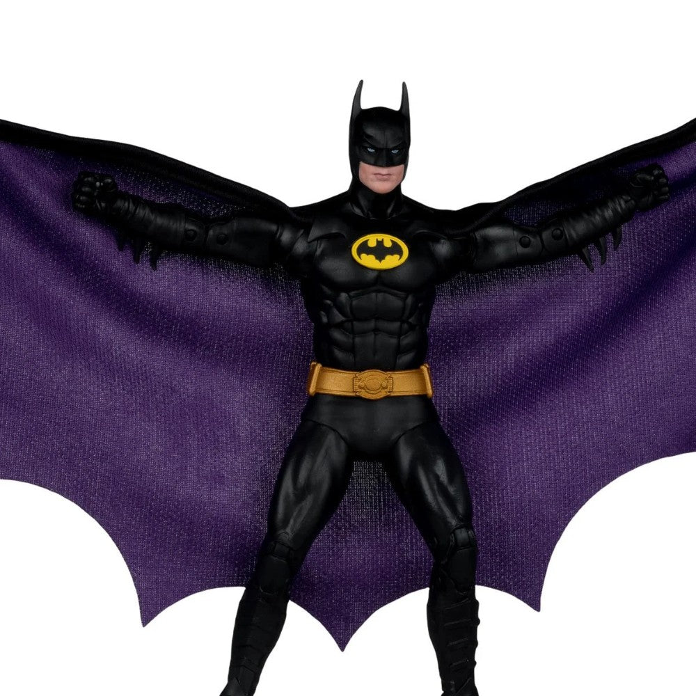 Batman - Page Punchers Wave 13 1:10 Scale 7” Action Figure McFarlane Toys with purple fabric cape and black suit.