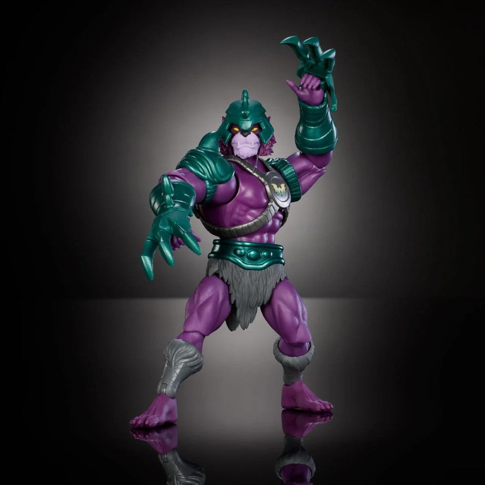 Mattel 6-inch Panthor-Man action figure with purple skin and green armor posed on dark reflective surface