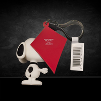 Side view of Snoopy 3D foam bag clip holding red kite by Monogram with keychain attachment and barcode tag