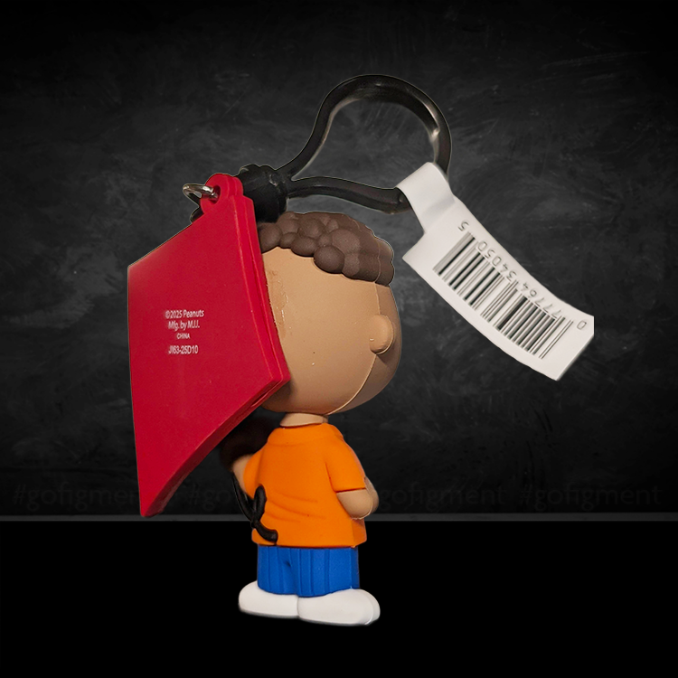Monogram Franklin Peanuts 75th Anniversary Series 3 foam bag clip holding a red kite keychain accessory