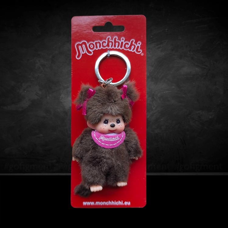 Sekiguchi Monchhichi plush keychain girl with pigtails and pink bib on red packaging card