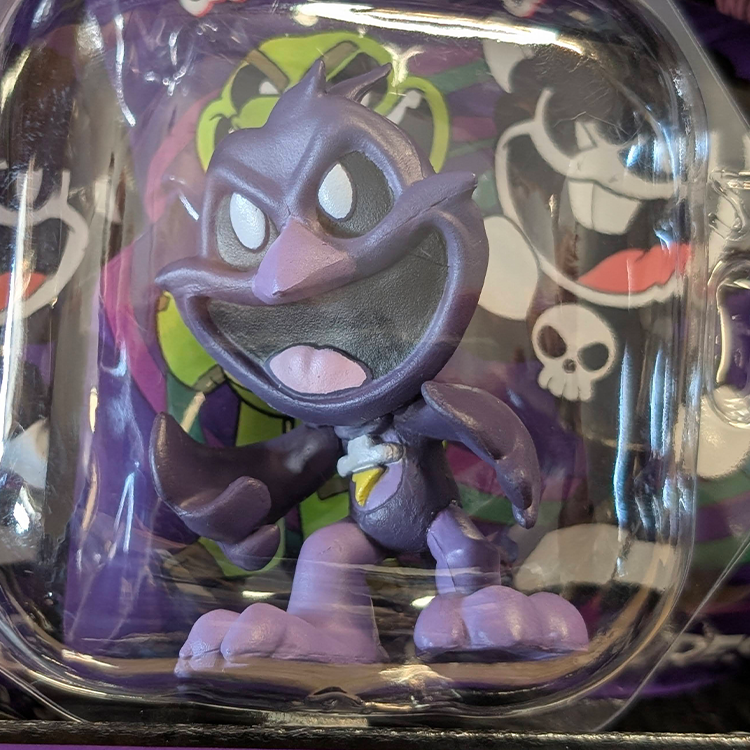 Go Figment Nightmare Critters Series 4 purple bird-like mini figure with yellow beak and mischievous expression in blister pack