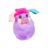 Purple plush creature with a pink tuft, mismatched floppy ears, green eyes, and a pink and purple nose