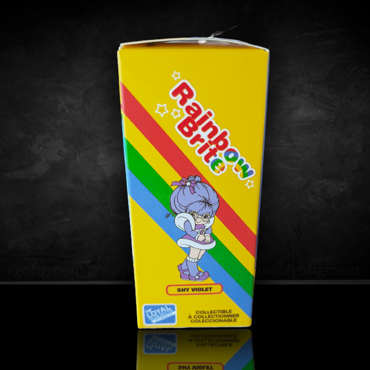 Yellow Rainbow Brite Shy Violet collectible figure box featuring character art and colorful stripes