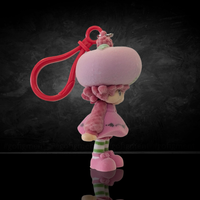 UCC World of Strawberry Shortcake soft flocked mini figure clip wearing large pink hat and red plastic clip side view