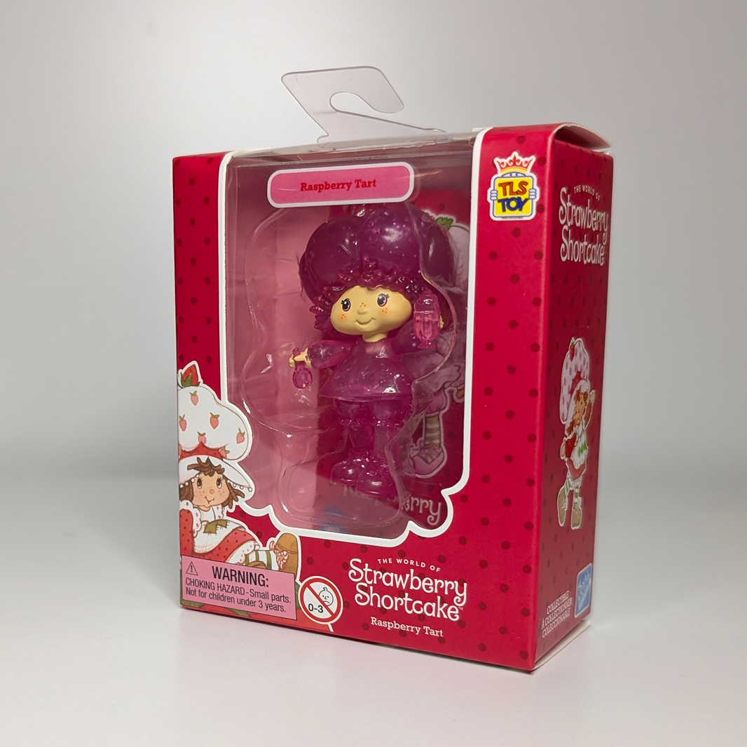Raspberry Tart Translucent 2.5" Strawberry Shortcake Cheebee Figure by Loyal Subjects in packaging with red and pink design