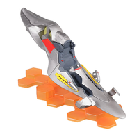 Futuristic silver spaceship model displayed on an orange hexagonal stand with detailed cockpit and control panels