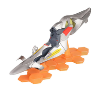 Silver and gray spacecraft model with red and yellow accents resting on an orange hexagonal base