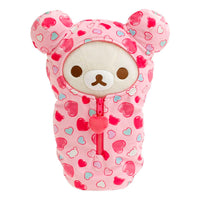 San-X Korilakkuma plush sleeping bag in pink hearts design with zipper and heart pull charm, 14.5 inches tall