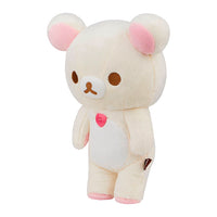 Korilakkuma plush from San-X in a pink hearts sleeping bag design measuring 14.5 inches tall with zipper closure.