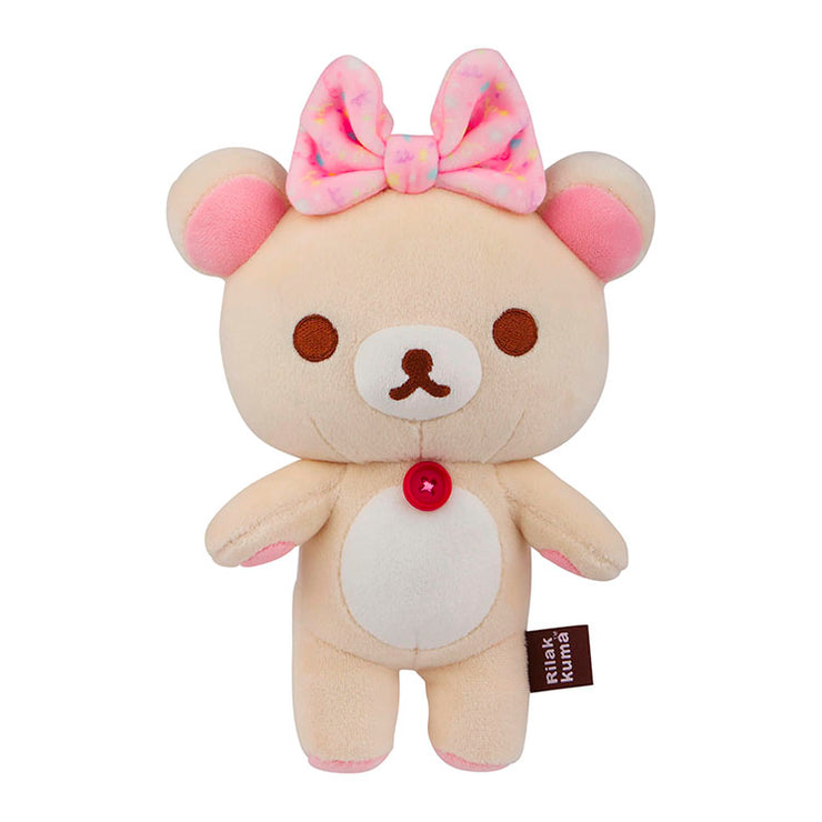 Korilakkuma plush mascot bear with pink bows and button detail by San-X, soft and squishy mochi style toy