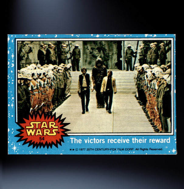 Image of #54 The victors receive their reward 1977 Topps Star Wars Trading Card