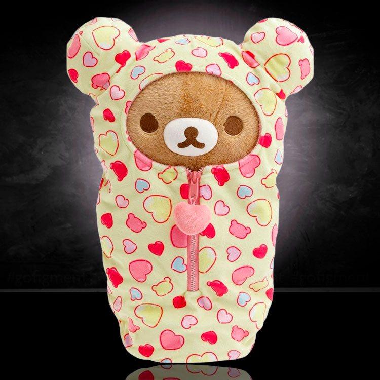 San-X Rilakkuma plush sleeping bag in yellow with pink heart patterns and a front zipper closure
